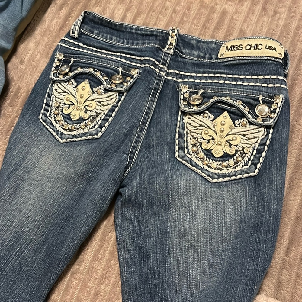 Selling light washed miss chic USA jeans